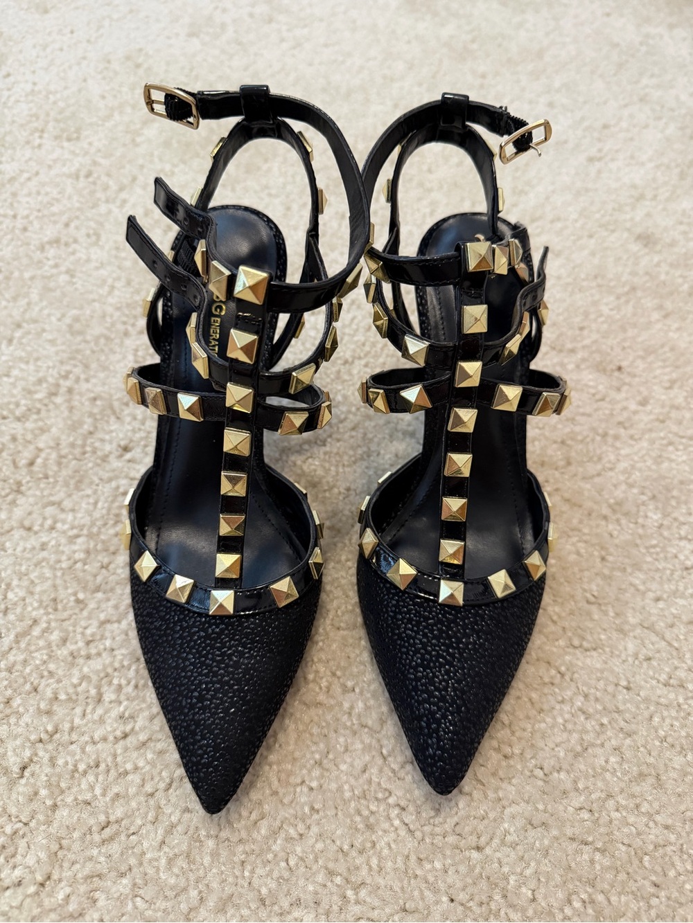 BCBGeneration Black Pointed-Toe T-Strap Pumps with Gold Studs